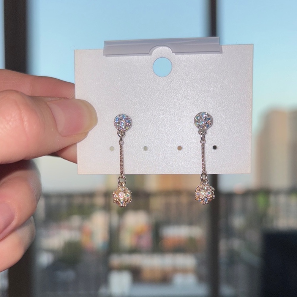 Silver tone Dangle Earrings with iridescent rhinestone details